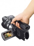 Sony NEX VG10 video camera in hand